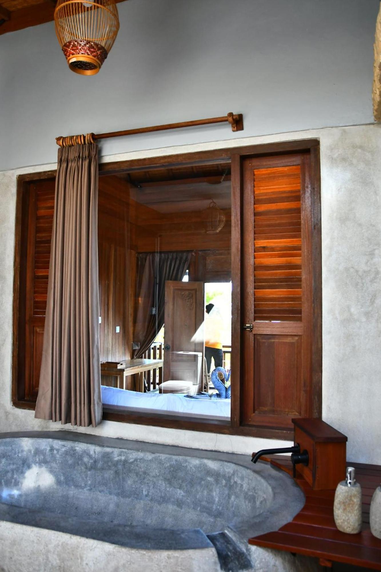 Putra'Lebah Amed Guest House Exterior foto