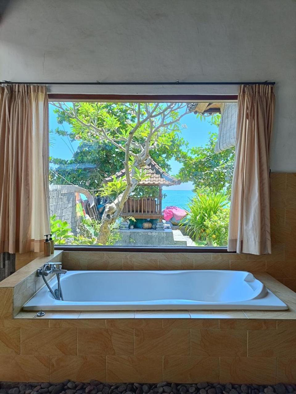 Putra'Lebah Amed Guest House Exterior foto